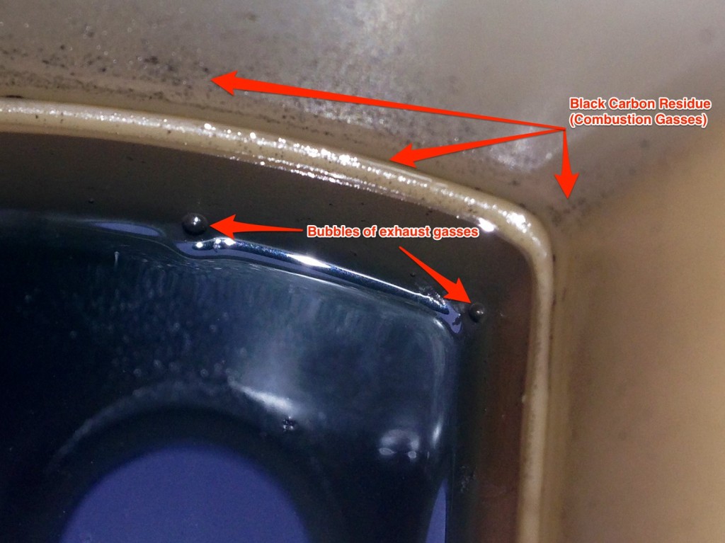 Exhaust gas analyzer head gasket test. Black residue in cooling system MINI cooper